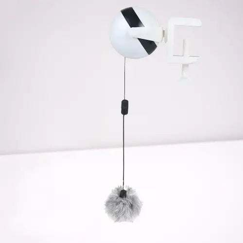 Automatic lifting ball cat toy with clamp and dangling fuzzy ball for interactive play