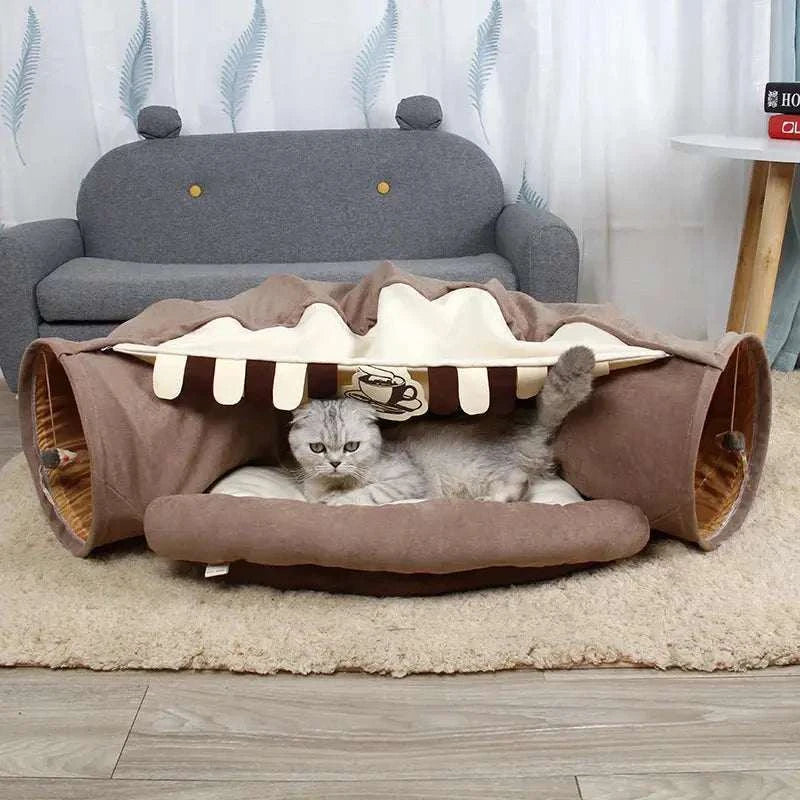 Cat Tunnel BedPetsCat Tunnel BedPaws And PensThere are three major things every cat loves: hiding, playing, and sleeping. Cat-centric companies have picked up on this fact too – that’s why products like cat cavPaws and pens