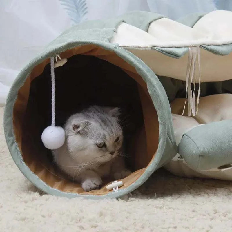 Cat Tunnel BedPetsCat Tunnel BedPaws And PensThere are three major things every cat loves: hiding, playing, and sleeping. Cat-centric companies have picked up on this fact too – that’s why products like cat cavPaws and pens