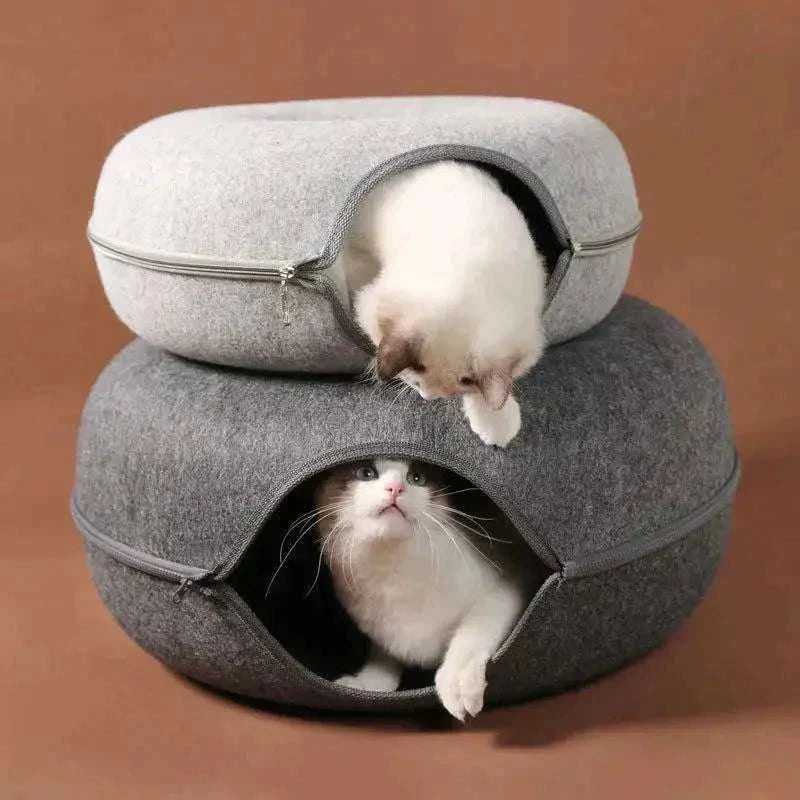 Donut Cat Tunnel BedDonut Cat Tunnel BedPaws And PensLooking for an amazing bed for your pets where they can also play?
Our Donut Cat Tunnel Bed is all that you need. It is a perfect combination of a toy tunnel and a cPaws and pens