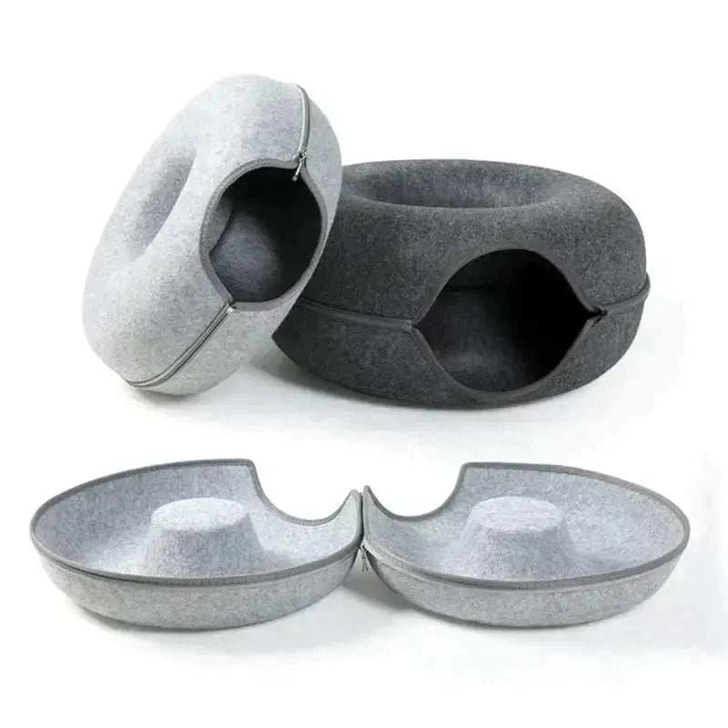 Donut Cat Tunnel BedDonut Cat Tunnel BedPaws And PensLooking for an amazing bed for your pets where they can also play?
Our Donut Cat Tunnel Bed is all that you need. It is a perfect combination of a toy tunnel and a cPaws and pens