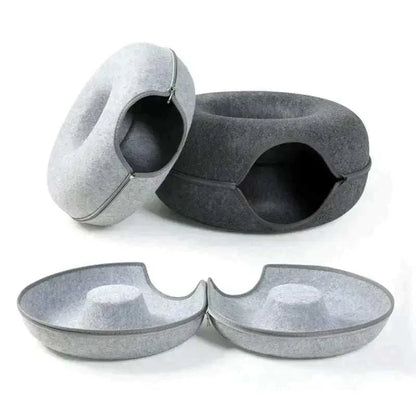 Donut Cat Tunnel BedDonut Cat Tunnel BedPaws And PensLooking for an amazing bed for your pets where they can also play?
Our Donut Cat Tunnel Bed is all that you need. It is a perfect combination of a toy tunnel and a cPaws and pens
