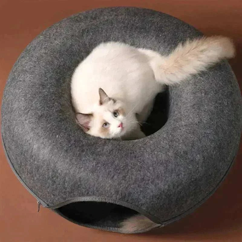 Donut Cat Tunnel BedDonut Cat Tunnel BedPaws And PensLooking for an amazing bed for your pets where they can also play?
Our Donut Cat Tunnel Bed is all that you need. It is a perfect combination of a toy tunnel and a cPaws and pens