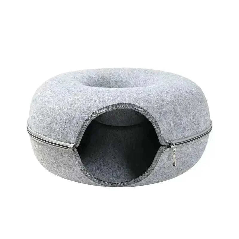 Donut Cat Tunnel BedDonut Cat Tunnel BedPaws And PensLooking for an amazing bed for your pets where they can also play?
Our Donut Cat Tunnel Bed is all that you need. It is a perfect combination of a toy tunnel and a cPaws and pens
