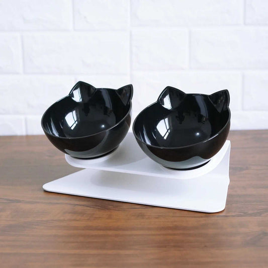 Double pet bowl with black cat-ear shaped bowls on a white ABS plastic stand for small dogs and cats feeding.